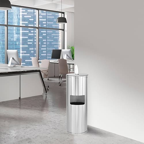 Stainless steel wipes dispenser mounted in a modern office break room for hygiene and surface cleaning UAE & GCC.